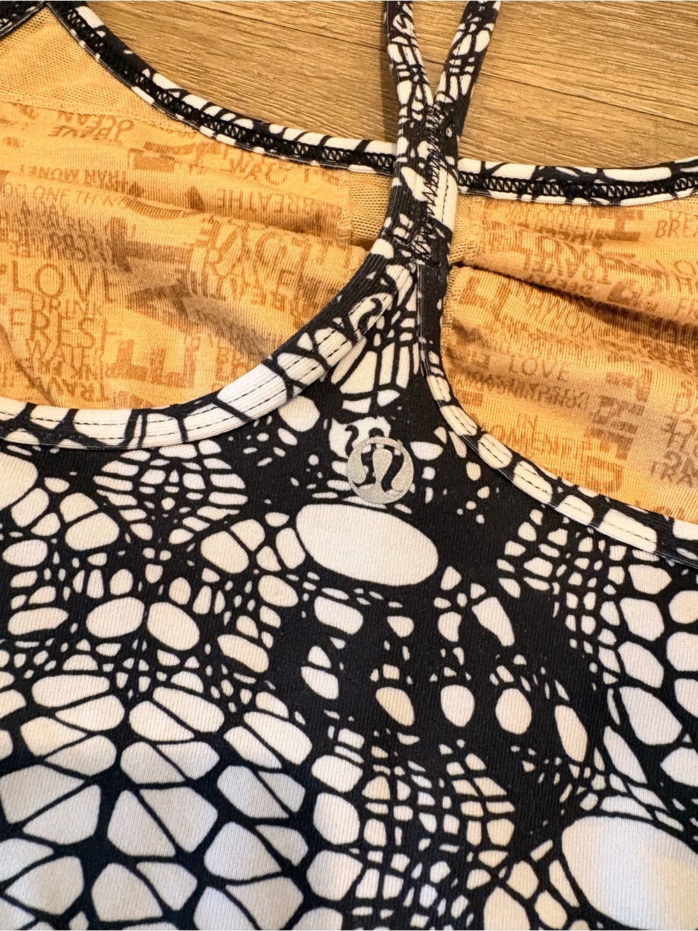 lululemon athletica Black and White Patterned Racerback Tank with Yellow Lining